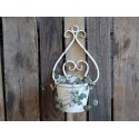 White flowerpot for wall wtih decor